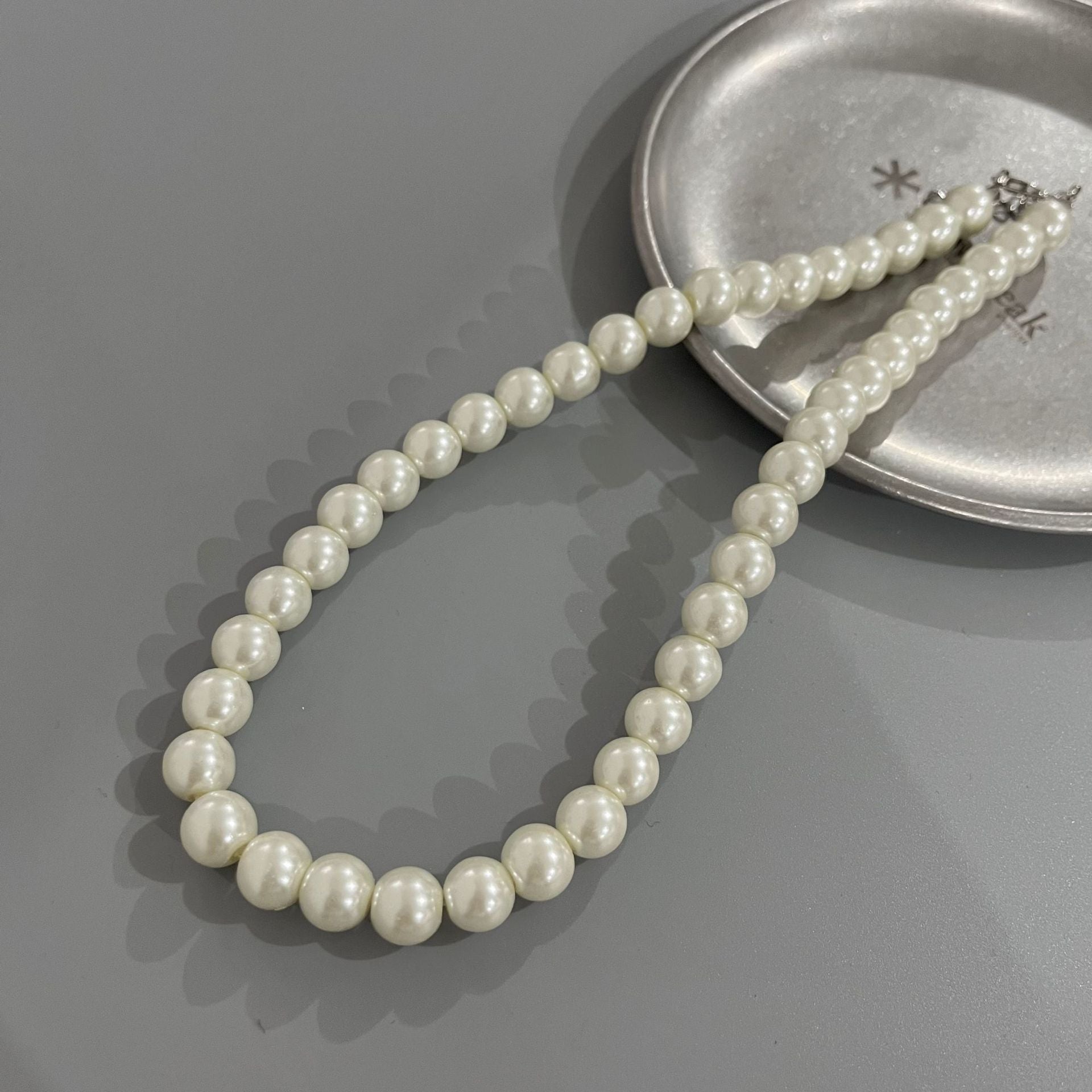 Wholesale Rice Bead Titanium Steel Necklace Hollow Heart Pendant Sweater Chain